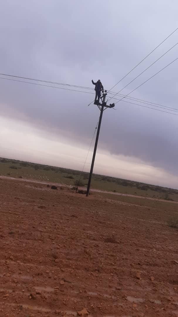 May be an image of 1 person and windmill